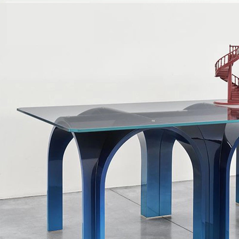 Contemporary Glass Dining Table with Arched Blue Metal Base | Luxury Room